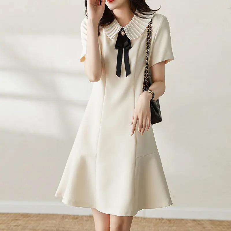 

Korean doll collar dress women's summer senior sense age-reducing temperament slim-fit fishtail skirt white dress black dress