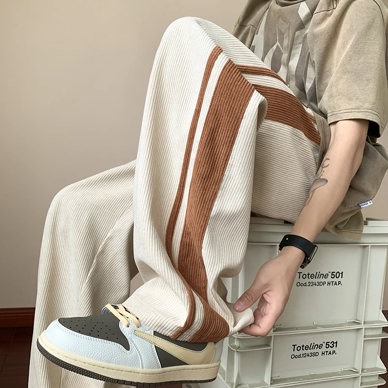 Мужские брюки в полоску сбоку свободные прямые широкие с разрезом большие