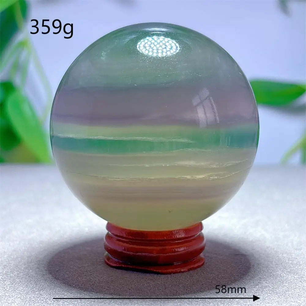 

Флюоритовая сфера лавандового цвета