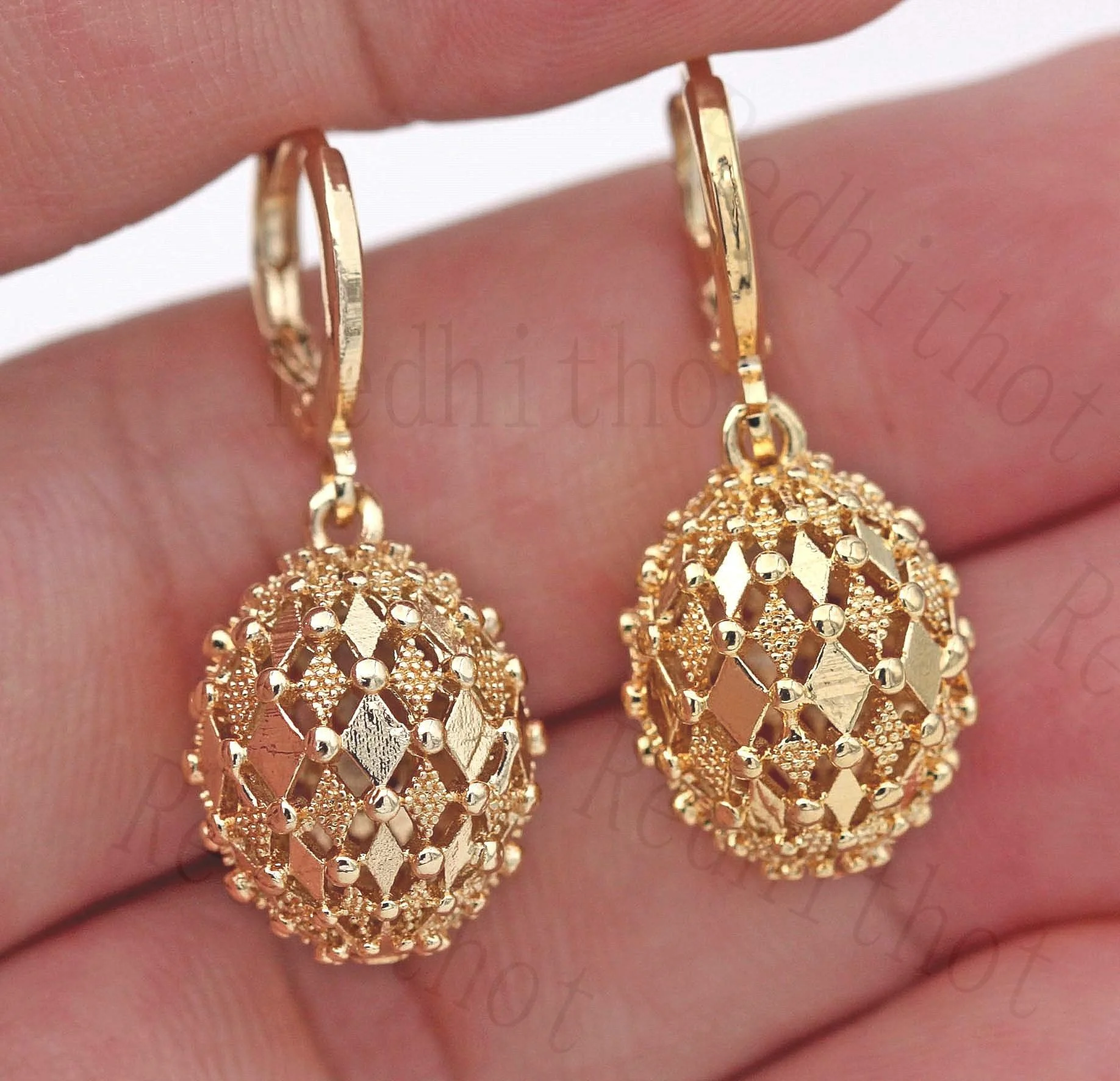 

Sophisticated Fashion Gold Color Rhombus Hollow Sphere Dangle Drop Earrings Creative Metal Carved Pattern Ball Drop Earrings