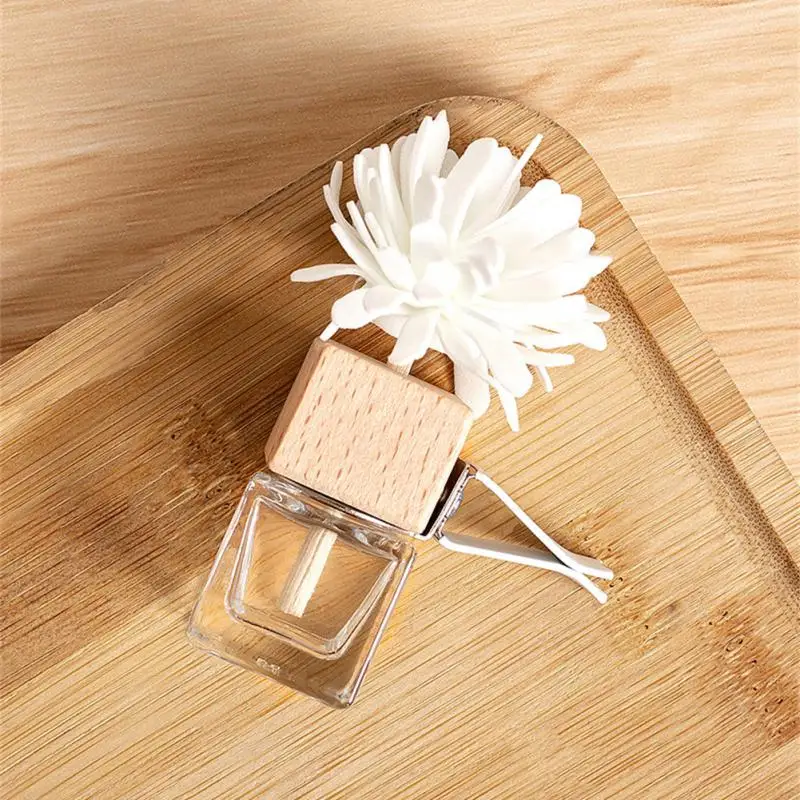 

Fashion Empty Bottle Of Essential Oil The Glass Bottle Body Wooden Bottle Caps Car Pendant Flower Shape Ornaments Simple