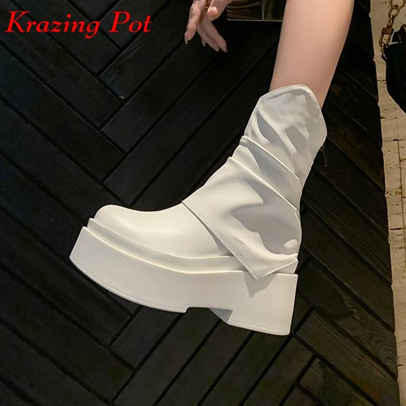 

Ботильоны из бычьей кожи на очень высоком каблуке с круглым носком