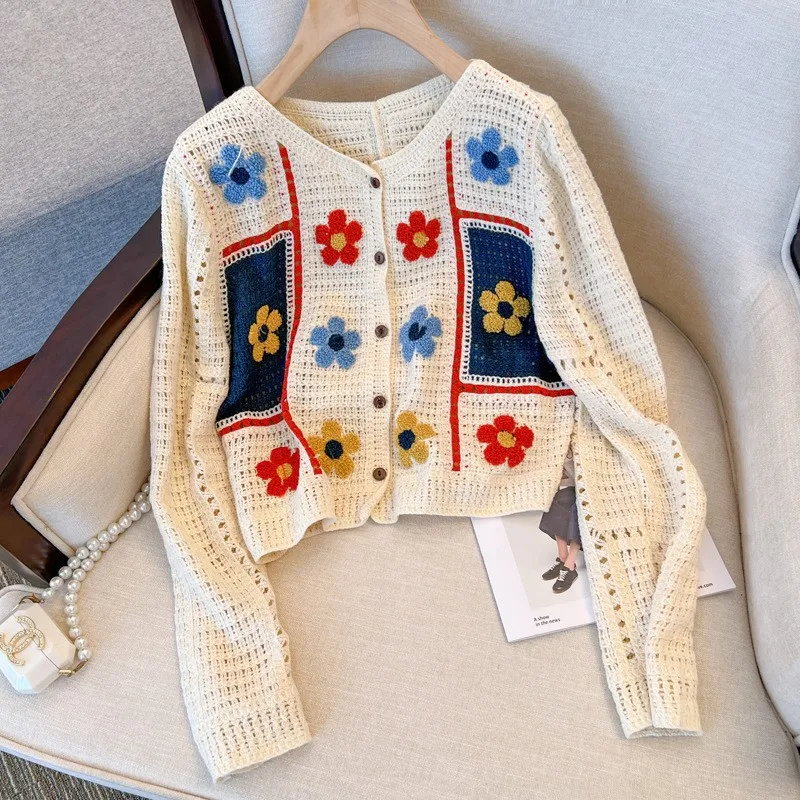 

Women's long sleeved hollowed out flower long sleeved knit sweater 2023 early spring new loose design feeling cardigan