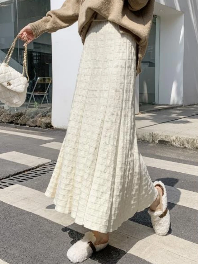 

Осенне-зимняя трикотажная плиссированная юбка Qiukichonson, модель 2023 года, корейская мода, повседневная трапециевидная юбка с высокой талией, цвет черный
