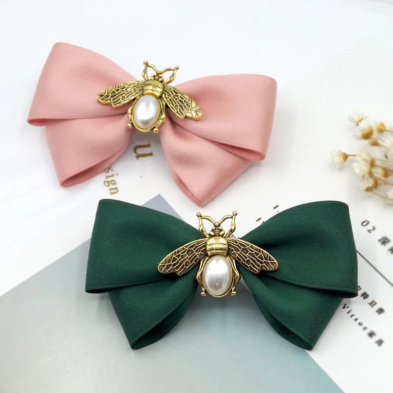 

Simple green crystal sweet bowknot lady's heart independent packing plating edge clip hairpin