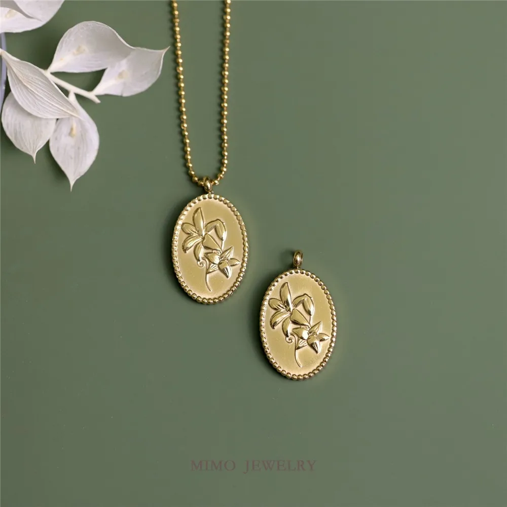 

Gold-plated titanium steel double sided lily relief vintage oval pendant DIY accessory