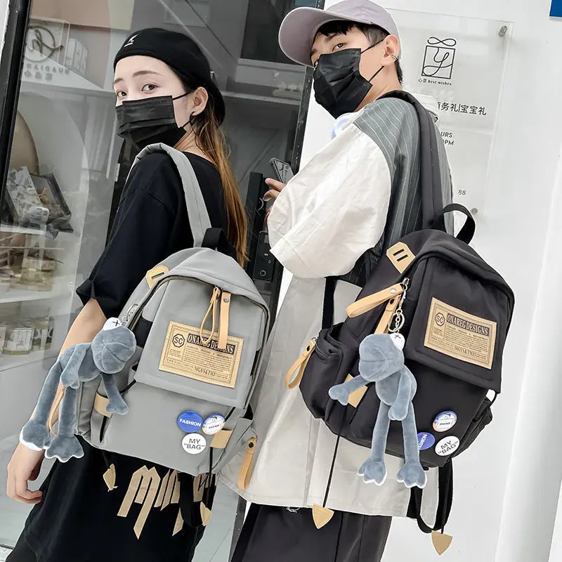 

Schoolbag men's ins brand personality backpack female junior high school Senior high school college students small backpacks