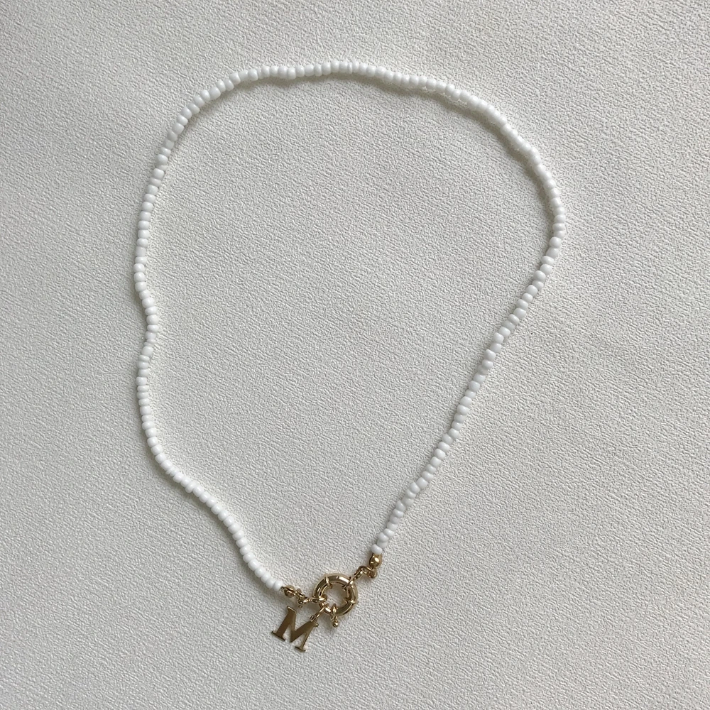 Золотой чокер из нержавеющей стали с бусинами tauam