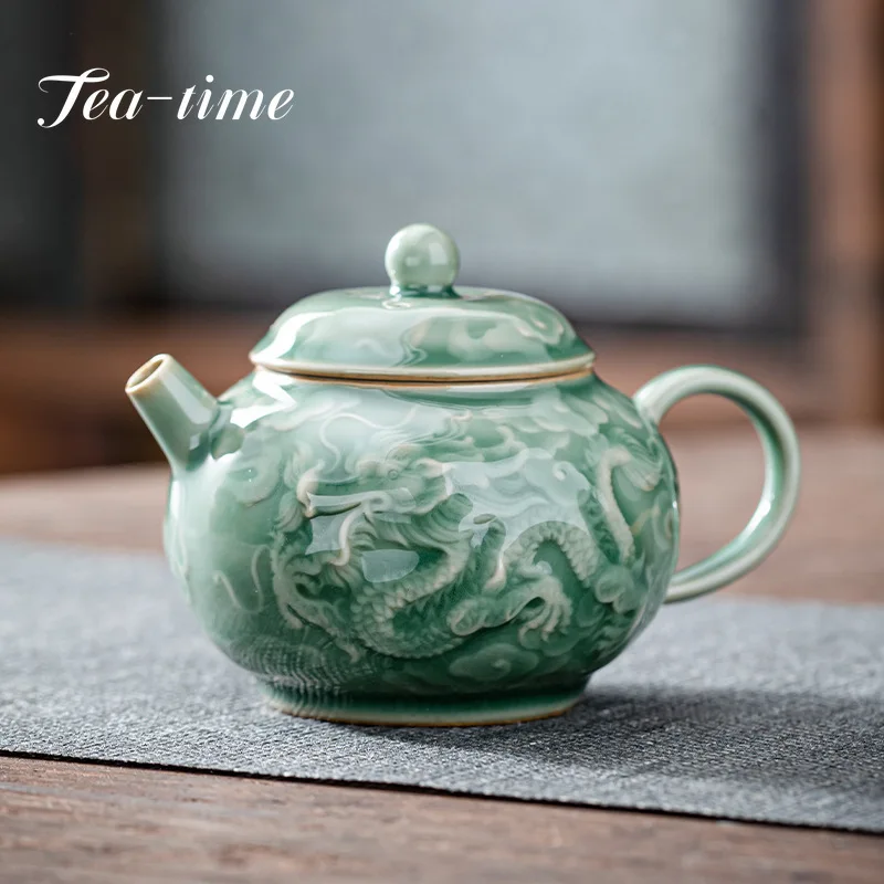 

150ml Yue Kiln Celadon Ceramic Teapot Handmade Engraving Dargon Tea Maker Small Teapot with Filter Hole Household Kung Fu TeaSet