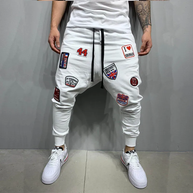 

Fashion Men Badge Patch Stitch Hip Hop Techwear Style Harem Pants Mens Casual White Little Feet Gym Sports Pants Pantalon Homme