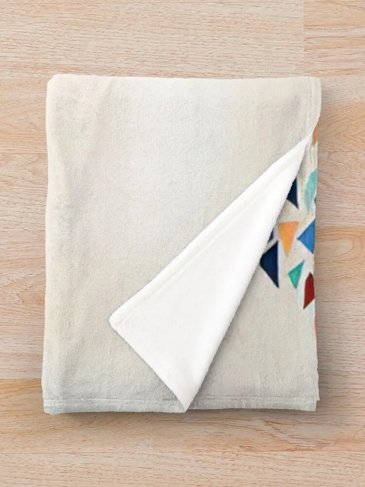 Цветные формы - Одеяло Robert Goodnough в клетку на диване. Свободные одеяла.