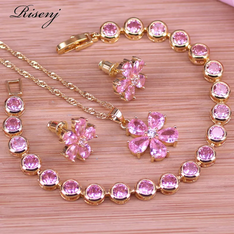 

Женские серьги-гвоздики под розовое золото с браслетом