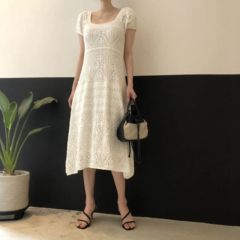 

Женское трикотажное мини-платье на одной пуговице, без рукавов