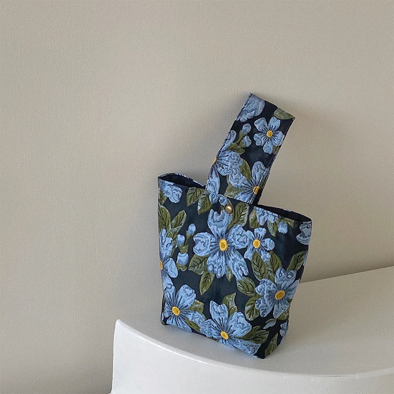 

Girls' spring and summer retro flower bag women's 2022 new blue jacquard minority hand bag, versatile square cloth bag