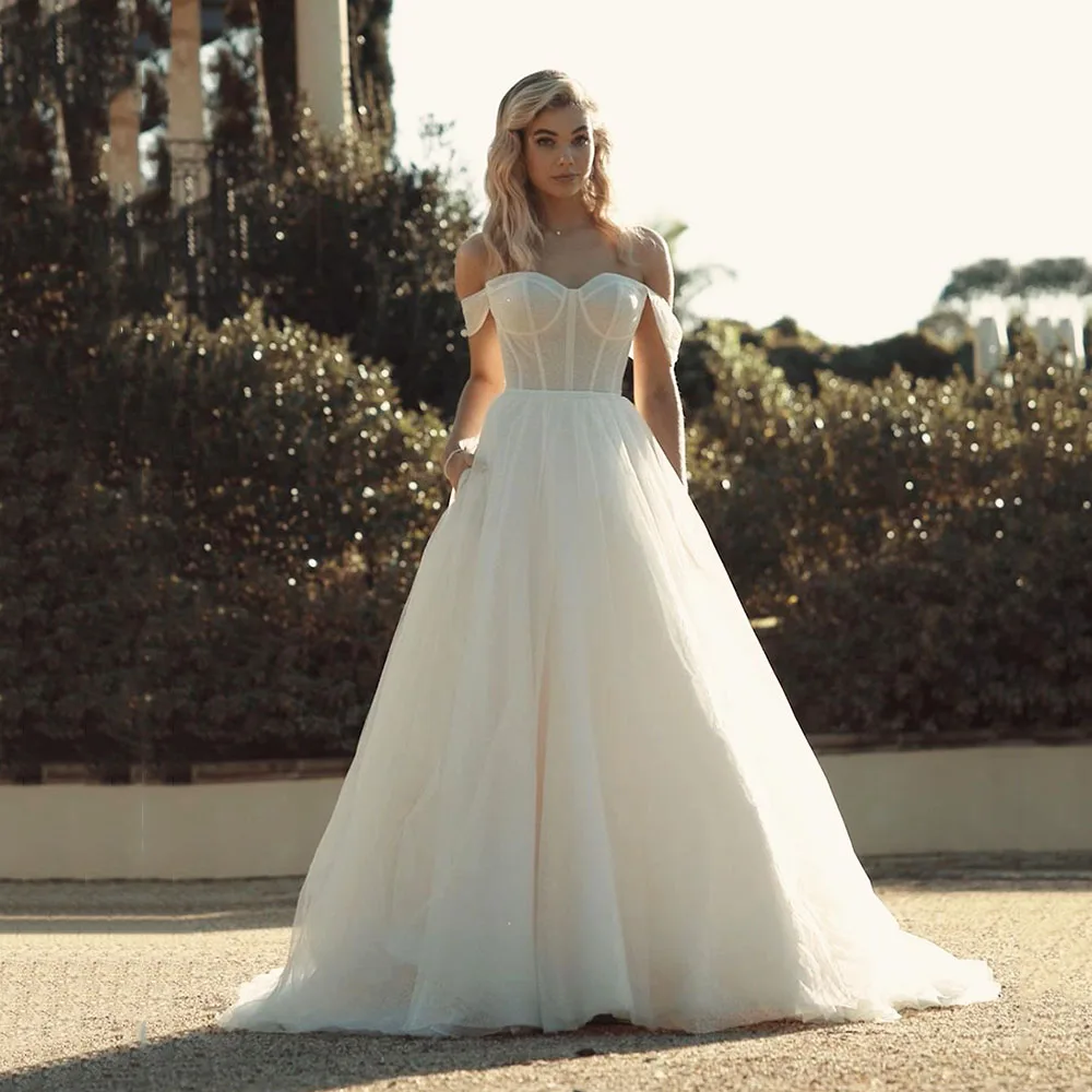 

Блестящие элегантные свадебные платья DOYMENY, трапециевидные Блестящие Свадебные платья с открытой спиной и открытыми плечами, модель 2024