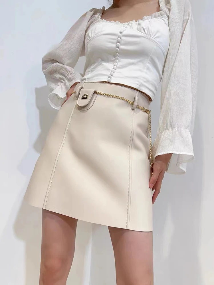 Юбка женская кожаная трапециевидная с завышенной талией и металлической