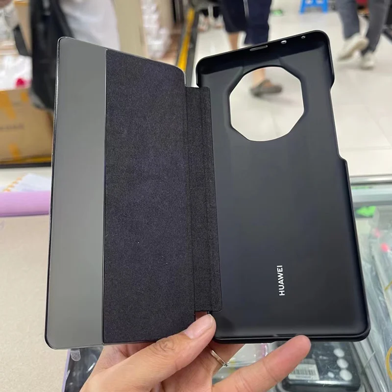 

Чехол-книжка из натуральной кожи для Huawei Mate 40 RS Porsche