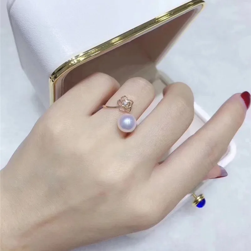 

Pearl Camellia Open Ring Female Fashion Flower Opening Rotate Ring wholesale Luxury Jewelry