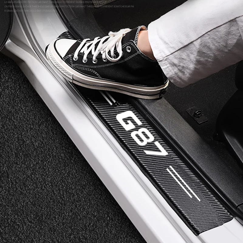 

Новые защитные наклейки на задний багажник автомобиля, наклейки на порог двери, педаль против царапин, наклейки из углеродного волокна для BMW M2 G87, аксессуары с логотипом