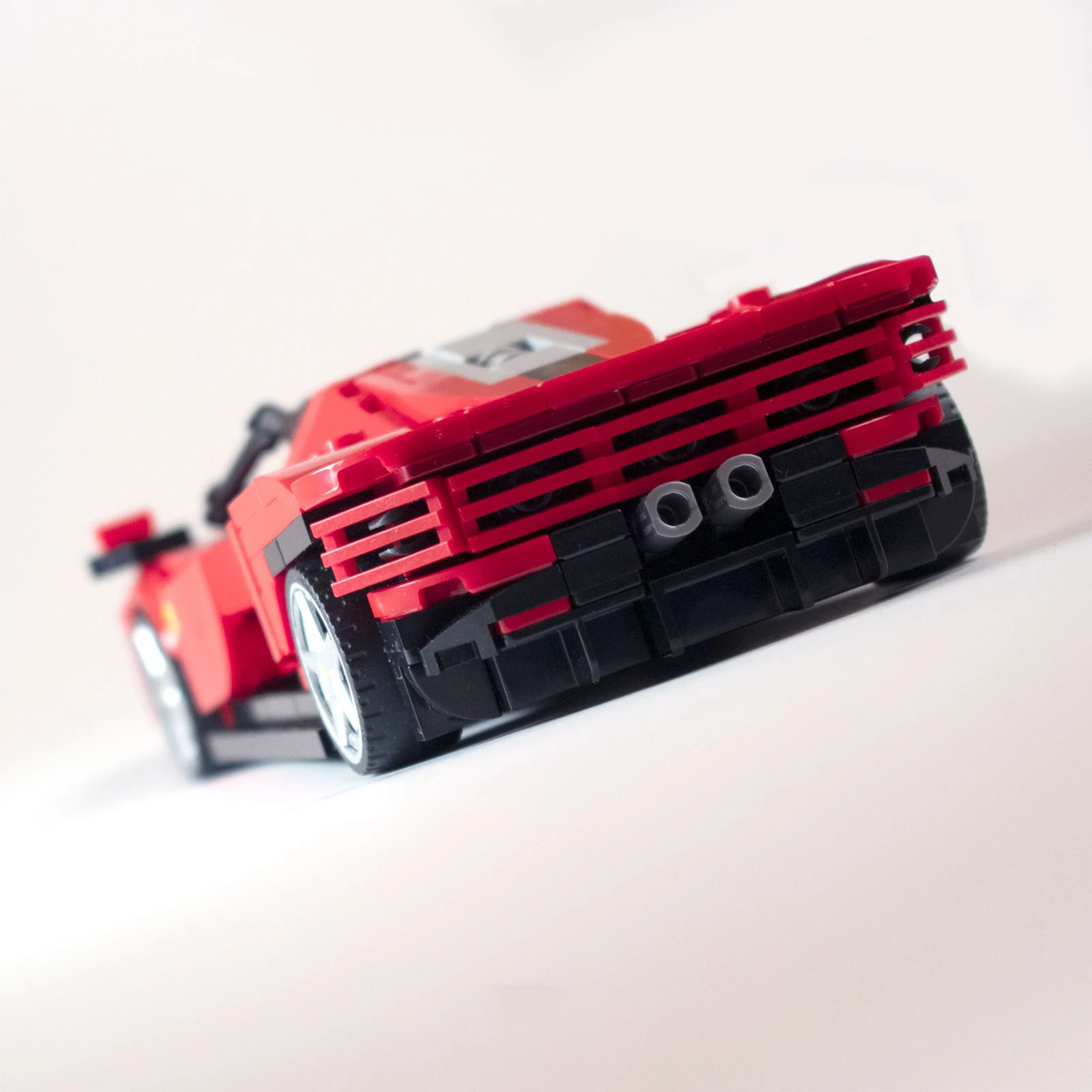 Фото Конструктор PolaDeer 459 деталей MOC: Спортивный автомобиль Daytona SP3 - Красный гоночный чемпион. Сборная модель из строительных блоков. Подарок на день рождения для детей. №4