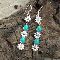 vintage extra long metal hand carved flower earrings set with green stone hook drop earrings for women