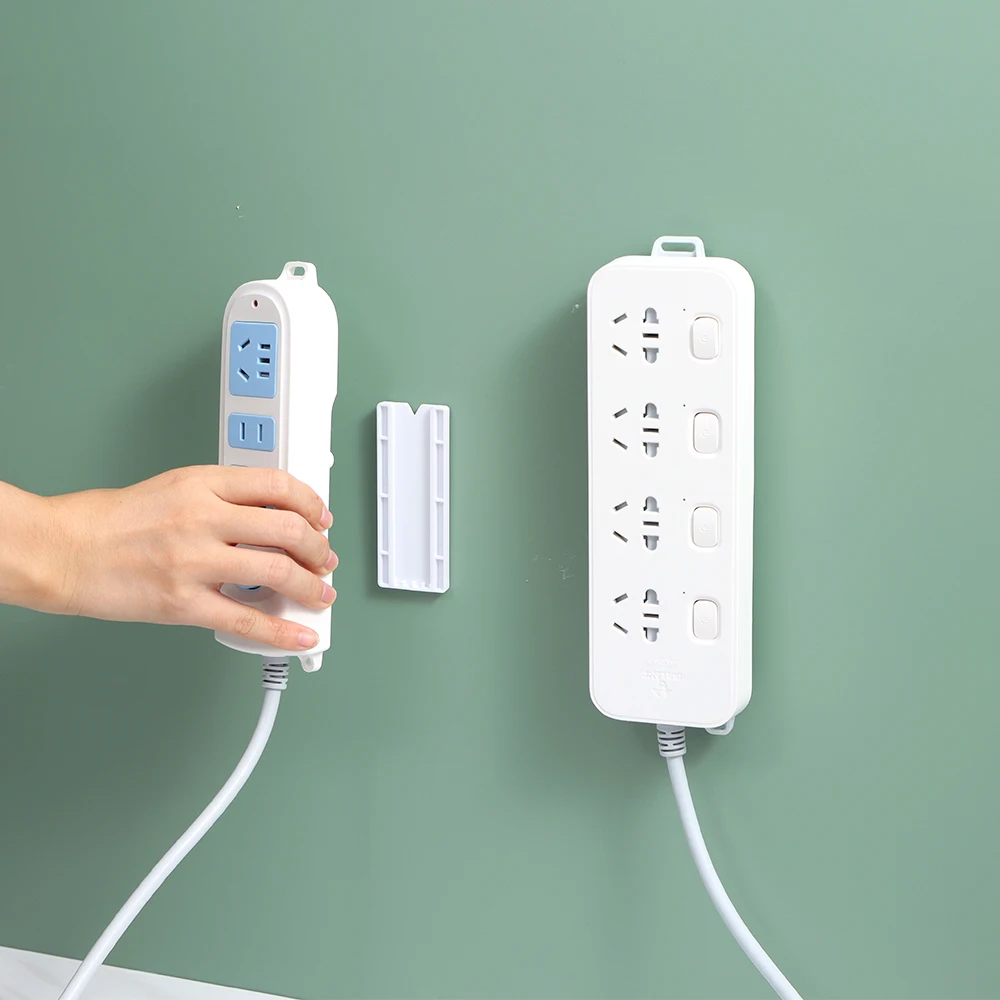 

Socket Organizer Wall Hanger Plug Power Strip Support Outlet Holder Traceless Fixer Home Self Adhesive Sockets Mounted Sticker