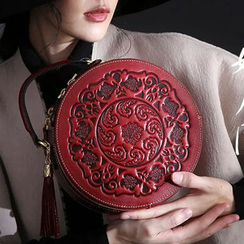 

Женская сумка из натуральной кожи, с верхней ручкой и кисточкой