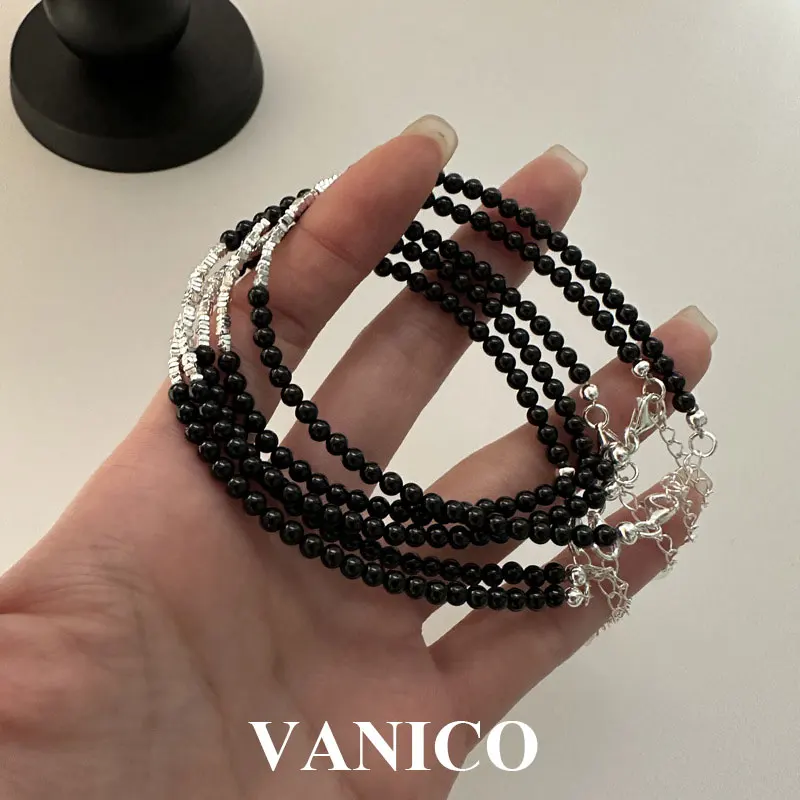 

Браслет из черного оникса и бусин из стерлингового серебра. Нежный простой браслет неправильной формы из гладкого круглого камня из агата и бисера для женщин.