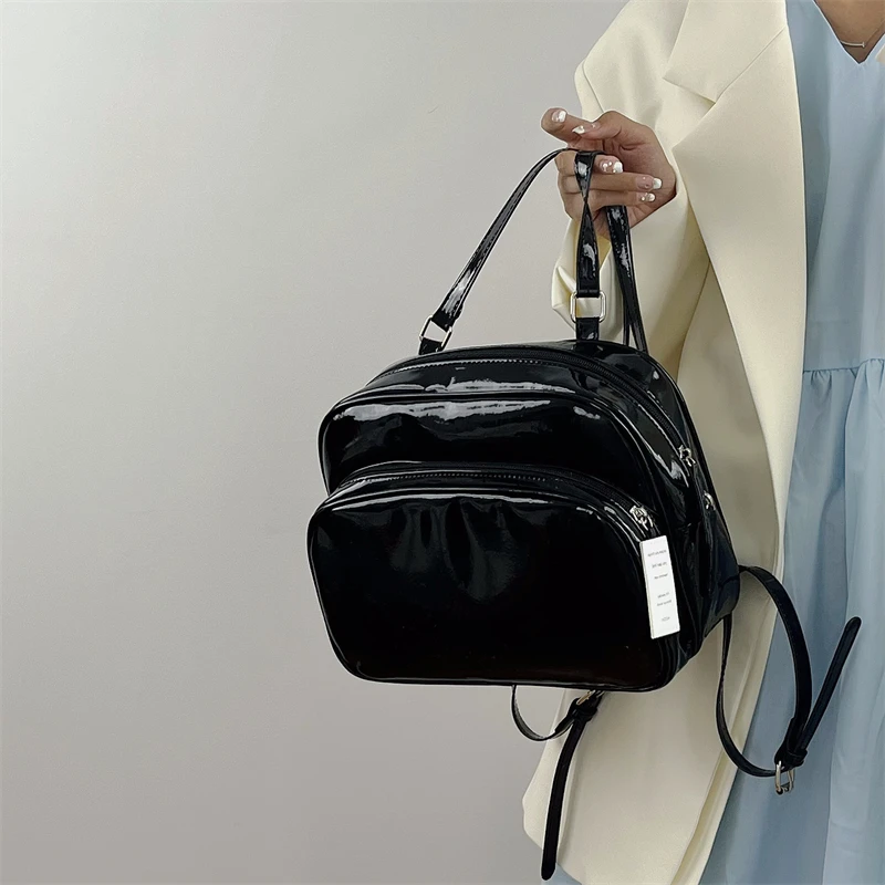Black PU Backpack 2023 New Women's Patent Leather Glossy Zipper Shoulder Bag Classic Casual Versatile Class Commuting Bags Trend