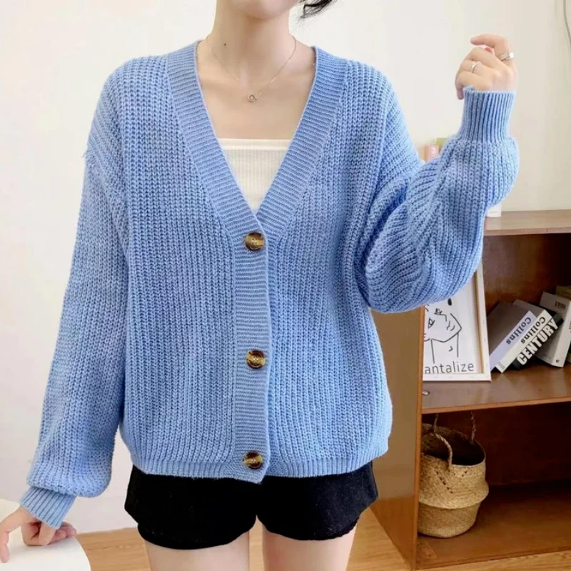 

2022 Cross Border Autumn and Winter New Korean Foreign Trade Solid Color Knitted Cardigan V-neck Sweater Coat Women