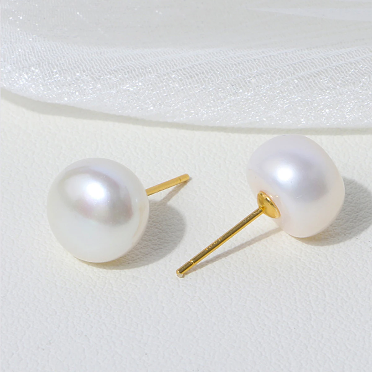 

Wholesale Natural White 9-10mm Freshwater Pearl and 925 Sterling Silver Stud Earrings for Women One Pair