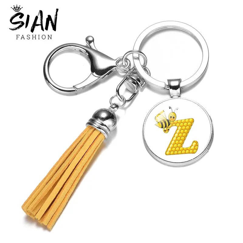 

Lovely Bee 26 Initial Letter Keychain Cute Honeycomb Alphabet Glass Cabochon Key Chain Leather Tassel Pendant Keyring Jewelry