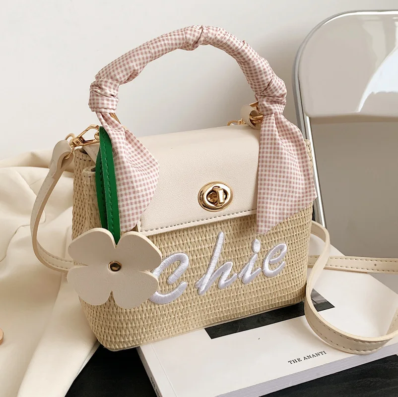 

High Quality Grass Woven Waist Bag Female Summer 2022 New Niche Design Beach Bag Cross Body Bag Woven Hand-held Small Square Bag
