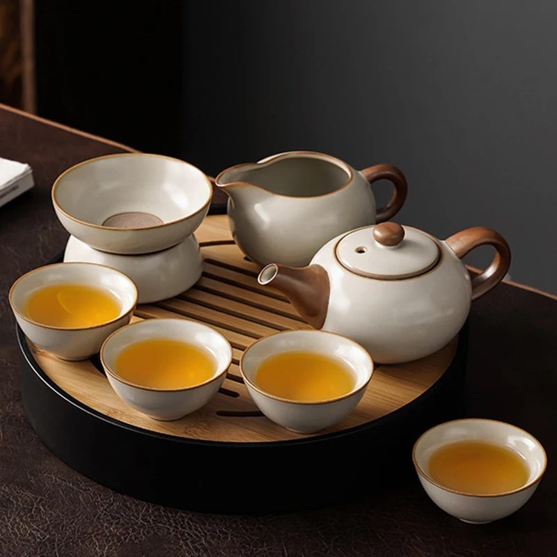

Travel Chinese Tea Set Pot Infuser Ceramic Kung Fu Tea Set Pottery Maker Portable Tray Traditional Taza De Te Drinkware WSW35XP