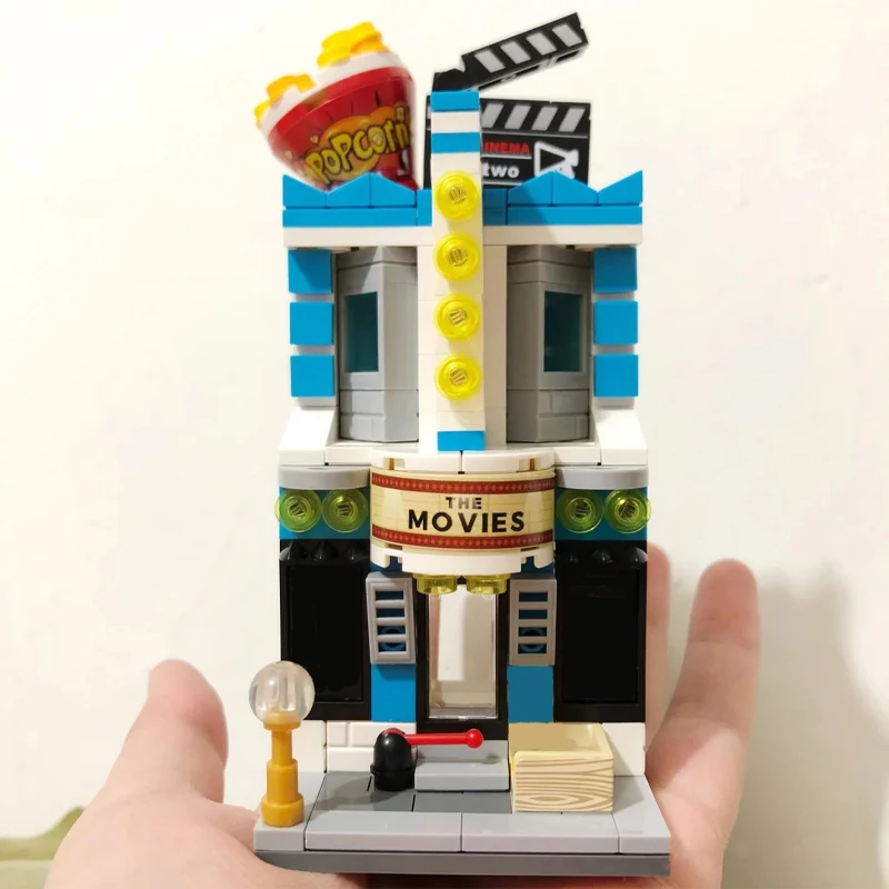 

Toy for Children City Street Cinema Movie Theater Popcorn Shop Store Architecture 3D Model DIY Mini Blocks Bricks Building