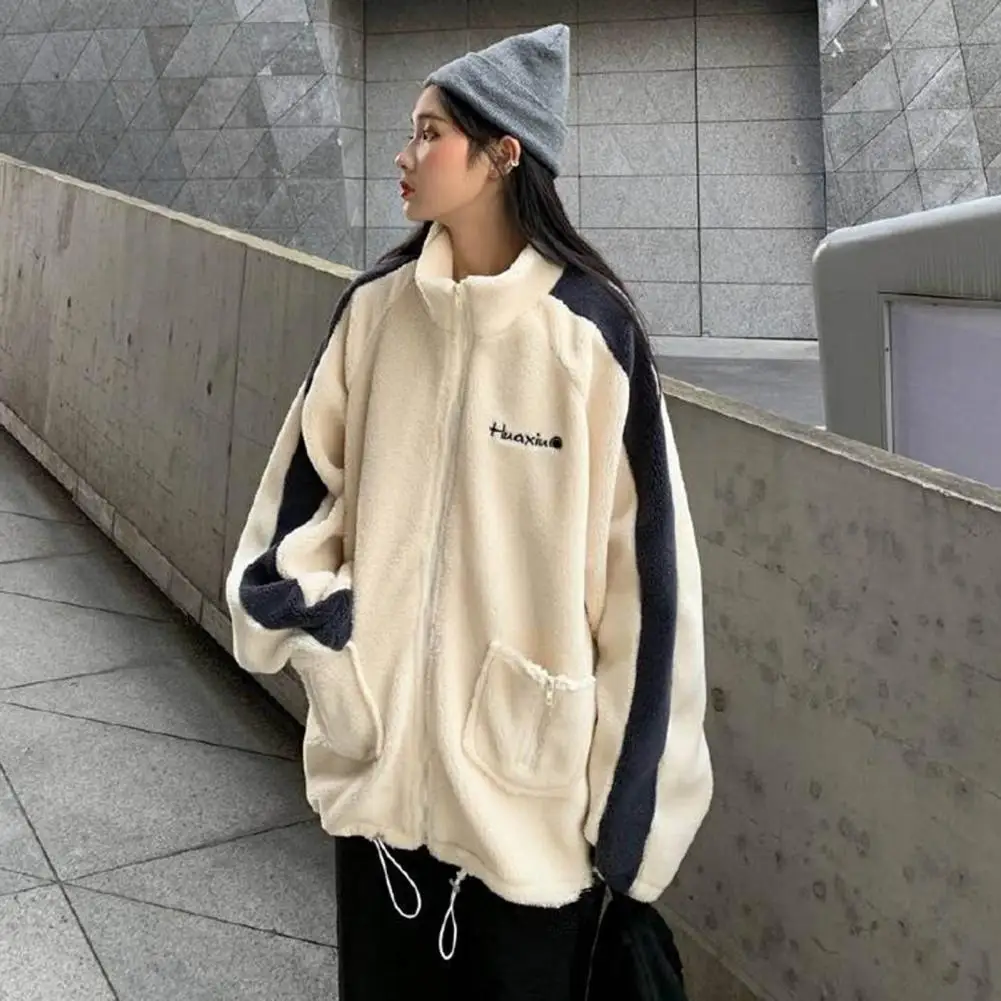 Женская флисовая куртка с воротником-стойкой и вышивкой |