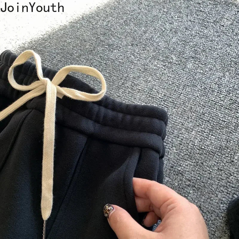 Брюки спортивные женские с карманами модные джоггеры на молнии повседневные