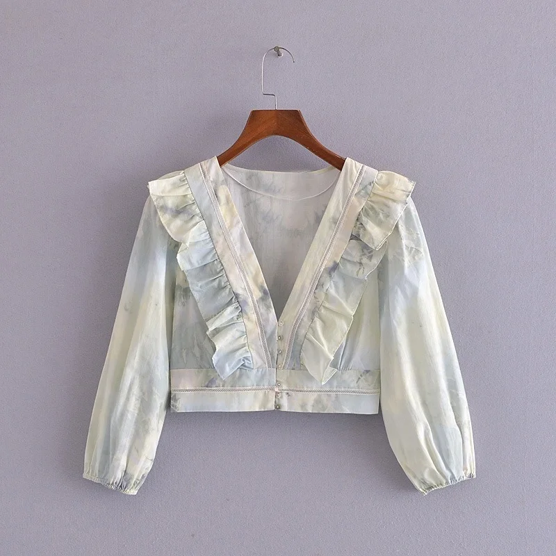 

Женская укороченная блузка с рукавами-фонариками и оборками