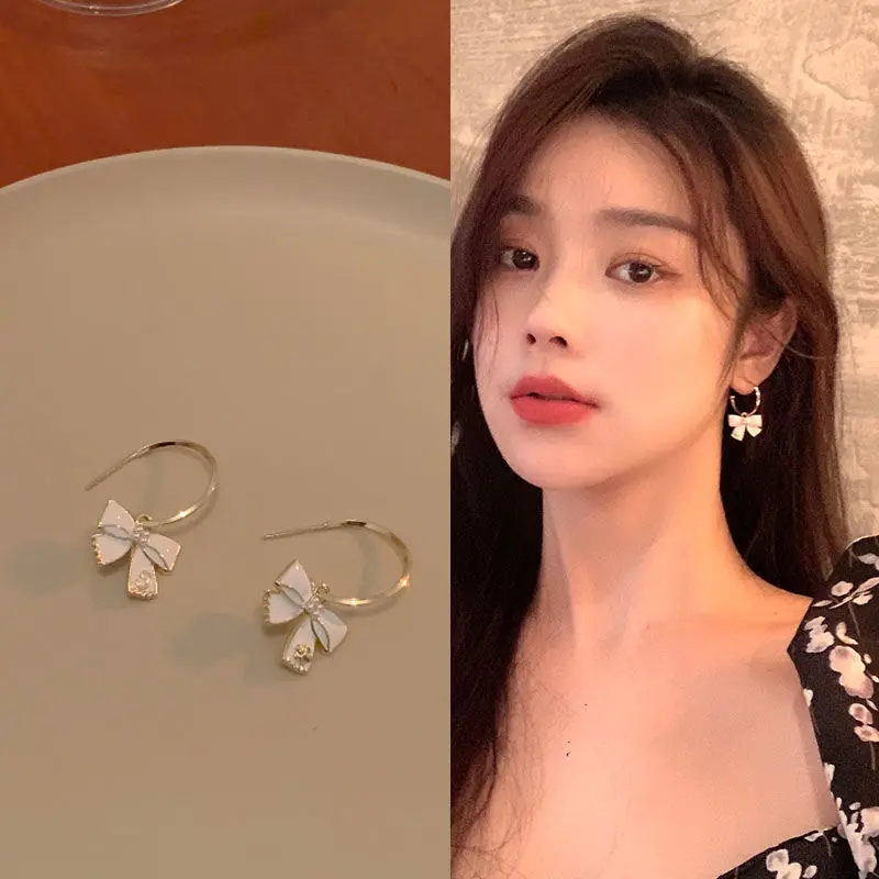 

2022 New Twinkle Sweet White Bow Earrings for Woman Korea Fashion Golden Bow Earrings Gift Charm Jewelry Wholesale