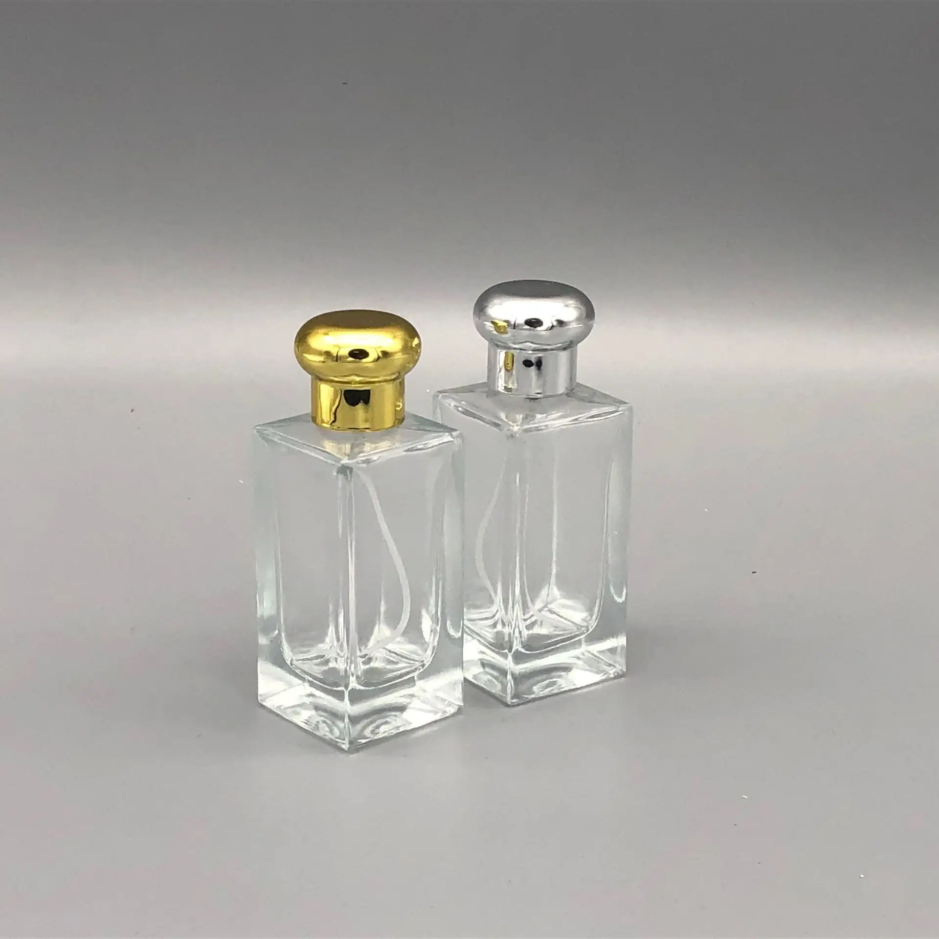 

5pcs 50ml Gold Round Lid Premium Perfume Refillable Bottle Portable Separate Delicate Cosmetics Fine Mist Spray Glass Containers