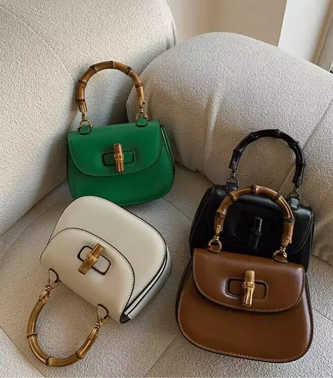 2023 new women's bags trendy fashion handbag shoulder cross bag bamboo section lock retro saddlebag niche bag