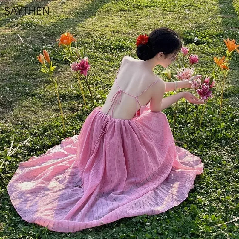 

SAYTHEN женское 2023 летнее розовое пляжное курортное платье пикантное на бретельках с открытой спиной во французском стиле с подвесными бретельками ТРАПЕЦИЕВИДНОЕ длинное платье ST236262