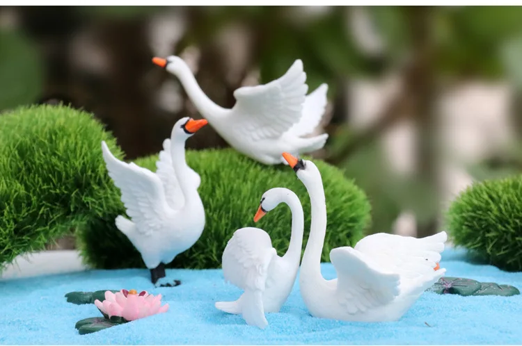 

Искусственные миниатюры лебедей