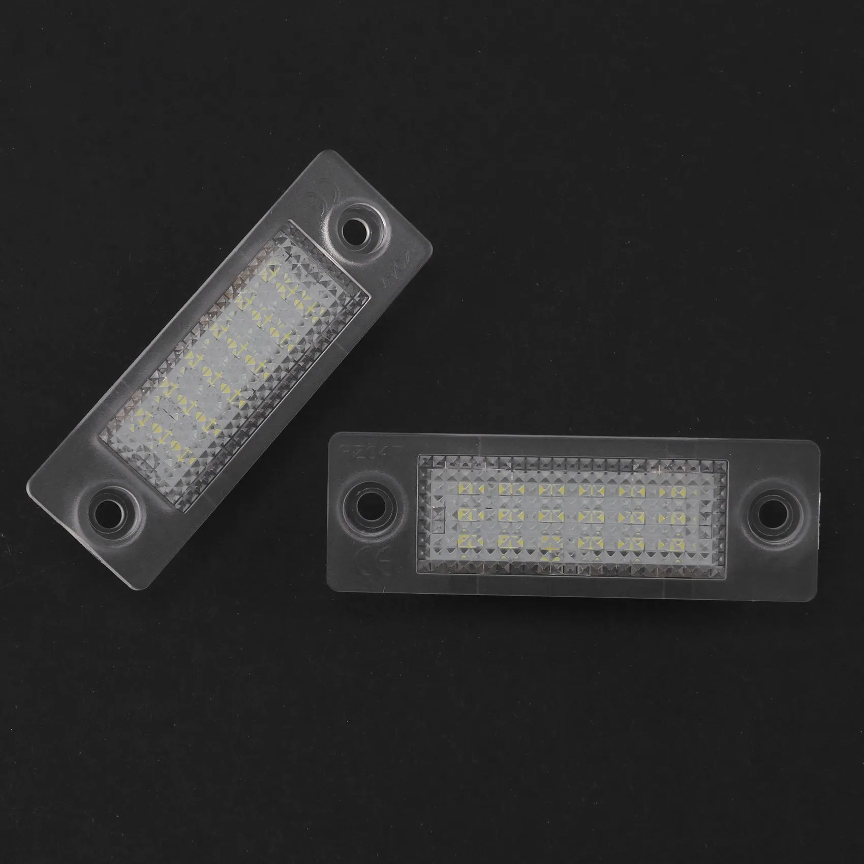 Фонари для номерного знака Passat Combi 06-08 Caddy 04-/Golf Plus 05-/Jetta 06-