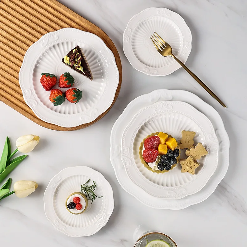 

Modern simple ceramic relief plate household European pure white dessert plate model room creative plate