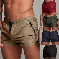 2022 summer new fitness sweat absorbing mens sports pants running slim solid color zipper pocket waist mens shorts