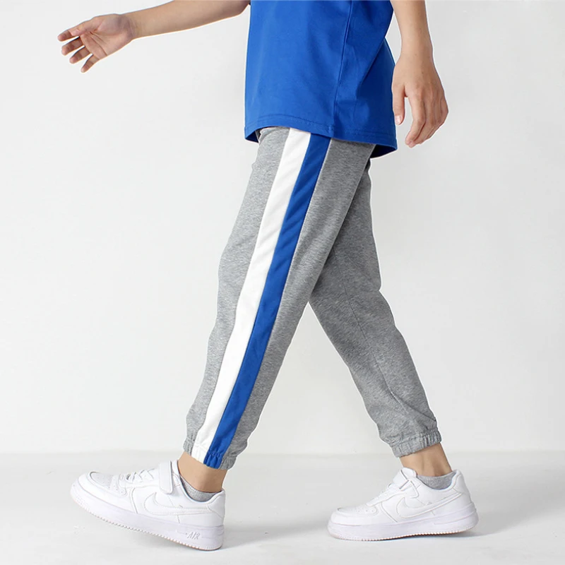 Детская одежда спортивные брюки модные с принтом по бокам на весну и осень