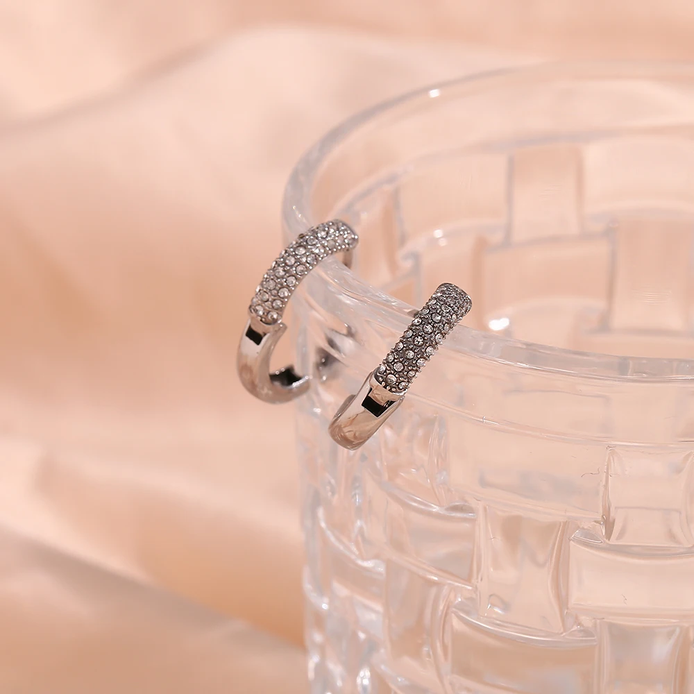 

Shiny Delicate Half Zircon Crystal Filled Small Huggies Hoop Earring For Woman Stainless Steel Waterproof Silver Color Earring