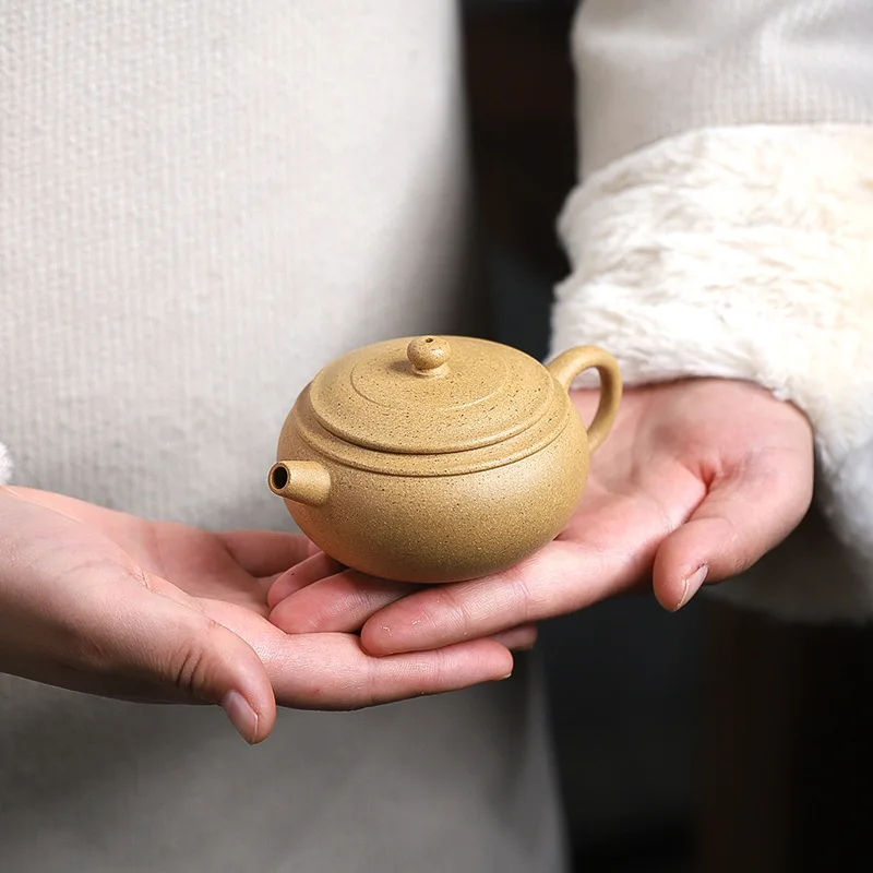 

Yixing Purple Clay Pot Gold Segment Mud round Drum110ml Chaoshan Single Personal Kung Fu Tea Set Small Capacity Teapot Wholesale