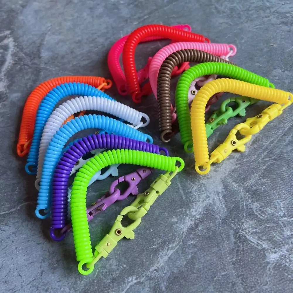 

2pcs Tactical Retractable Plastic Phone Spring New with Ring 10Colors Elastic Rope Security Gear Tool Outdoor Hiking